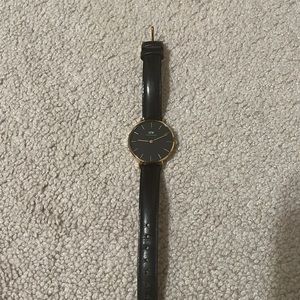 Daniel Wellington black and gold watch